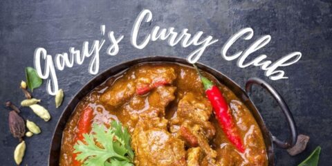 A delicious traditional Indian curry lamb masala close-up in a Korai