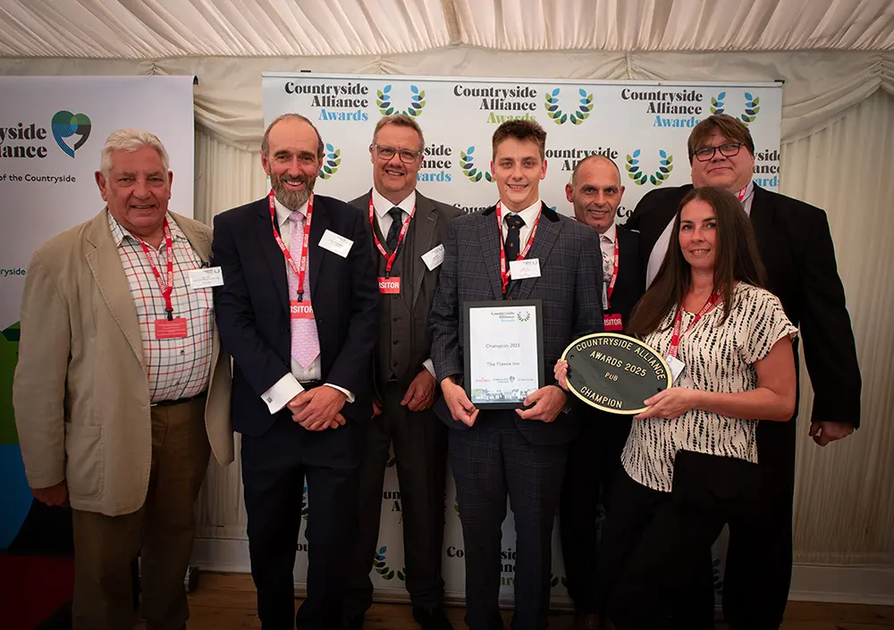 The Fleece Inn team celebrating their Countryside Alliance Best Pub Award